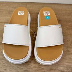 Reef Women's Cushion Bondi Bay Platform Slide Sandals in White/Tan